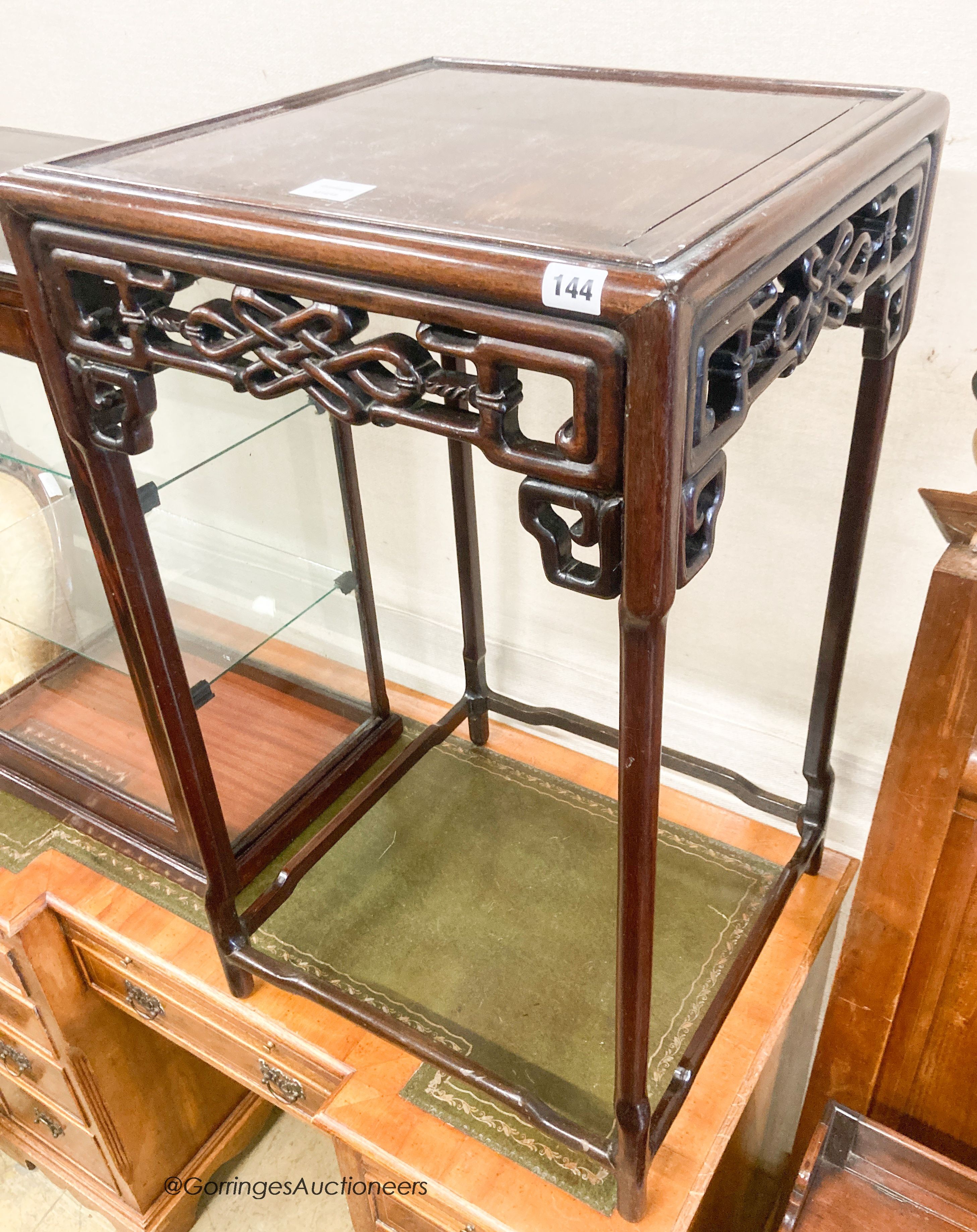 A Chinese hardwood square topped table, width 47cm, height 83cm